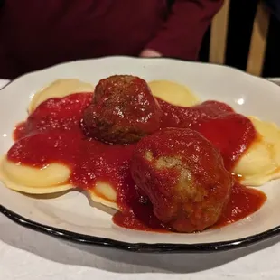 Ravioli plate with meatballs.