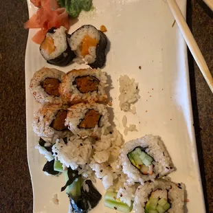 Sushi roll lunch with salmon, spicy tuna, and California roll