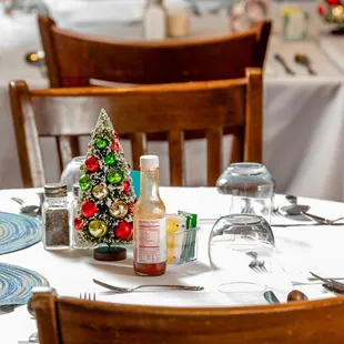 a table set for christmas dinner