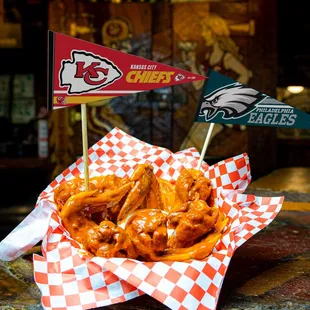 a basket of buffalo wings