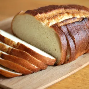 a loaf of bread on a cutting board