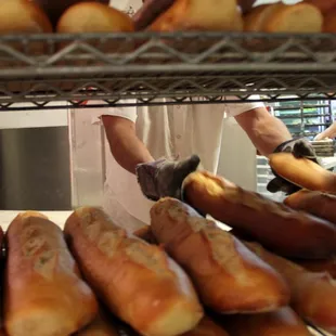 a baker working in a bakery