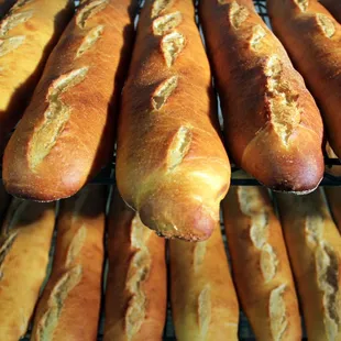 a bunch of breadsticks on a rack