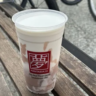 I opened the lid to eat the taro toppings but this is a taro milk with taro balls! no ice