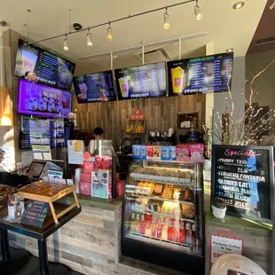 a woman working at a coffee shop