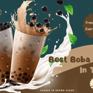 two boba cups with milk and blackberries