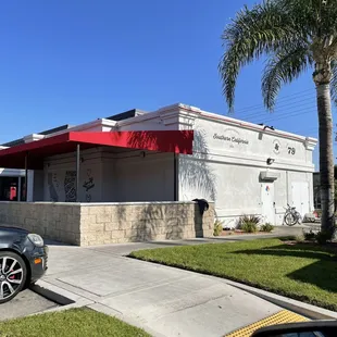 a car parked in front of the building