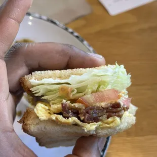 Inside of egg and bacon Breakfast Sandwich