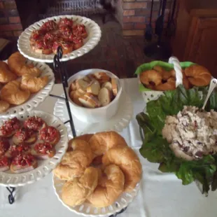 Tea sandwiches and small bites artfully displayed on your table for guests to enjoy