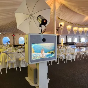 Wide monitor so you won't need to squint your eyes to see yourselves pose :D ...Ask us to put your photo on the welcome screen!