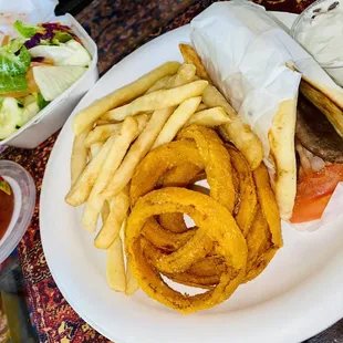 Gyro Dinner Plate, sauce on the side. (Plate comes with fries, onion rings &amp; salad) Their onion rings are big, nice &amp; crispy.