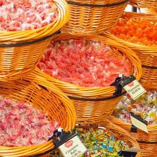 a variety of candies in baskets