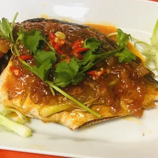 Fired fish with tomato sauce