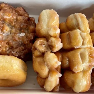 Apple Fritter, Glazed Donut, and  Glazed Donut