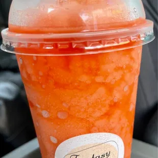 Watermelon slushy with bursting bubbles