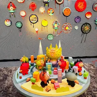 a display of toys and clocks