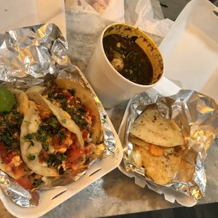 a bowl of soup, tortilla, and tortilla