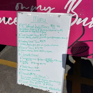 a menu for a taco truck