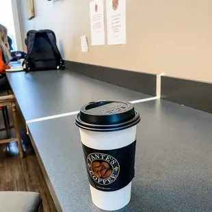 Taped off bar for distancing.