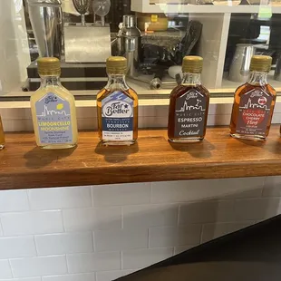 a row of different bottles of liquor
