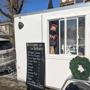 Sunday Morning food cart and the owner. Schedule is 8:30 am until she sells out, or 12:30 pm. whichever comes first.