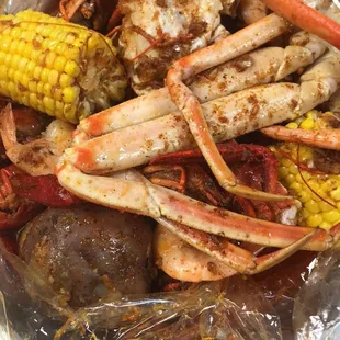 crab legs and corn on the cob