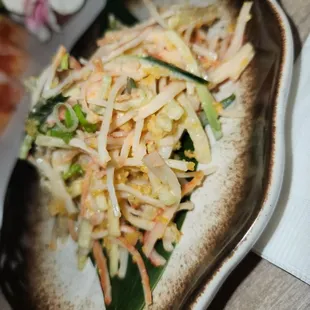 Kani salad. It said it comes on a bed of lettuce but there was just a strip of ti leaf