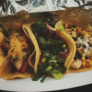 Pork, tofu and chicken tacos. 3 for $8