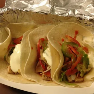 chicken, salsa roja, grilled peppers, and cheesy lime crema