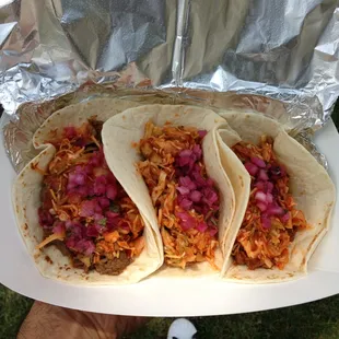 Beef, Chicken and Pork flour tacos with Lime-Kimchi dressing.