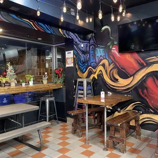 a colorful mural on the wall