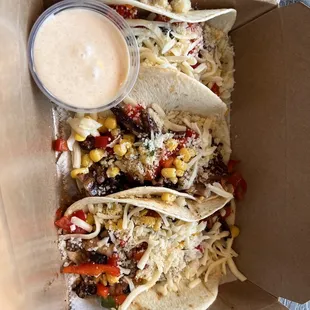 Mini squid tacos with sweet Spivey pineapple sauce