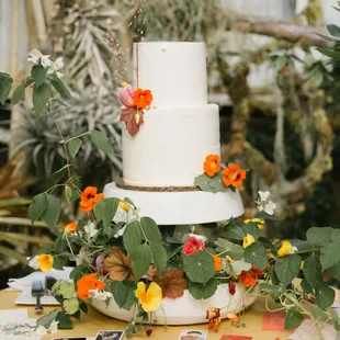 Beautiful cake by Far Out Catering. Florals by Bewilder Floral.