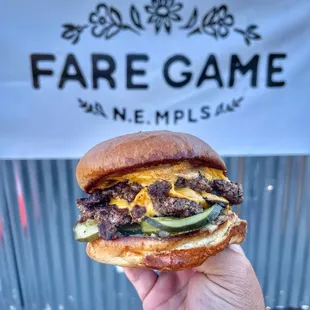 Fare Game Burger 2 Smashed Patties, American cheese, White BBQ, Griddle Onions, Mustard Pickles, Brioche bun
