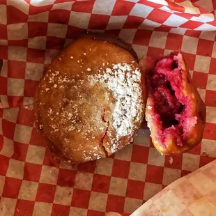 Donuts with lots of raspberry rhubarb filling
