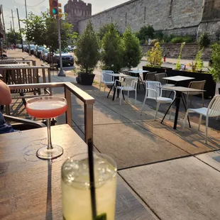 a glass of lemonade and a glass of lemonade on a table