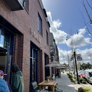 Outside of building and small line.