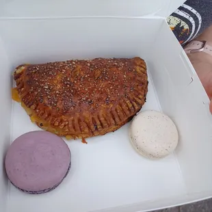 a pastry and macaroni in a box