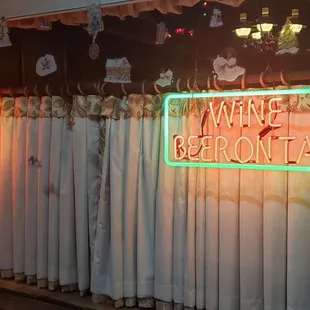 a neon sign in a window