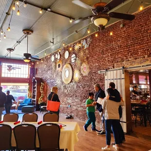 a group of people standing in a room