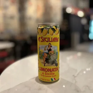 a can of lemonade on a table