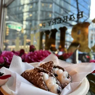 a person holding a plate of food