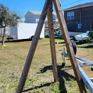 One way to support a bowsprit until it's secured to the bow of the boat.
