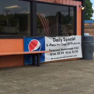 Side of hotdog stand.