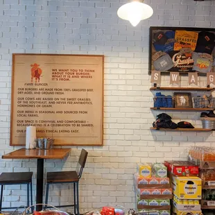 a brick wall with a menu on it