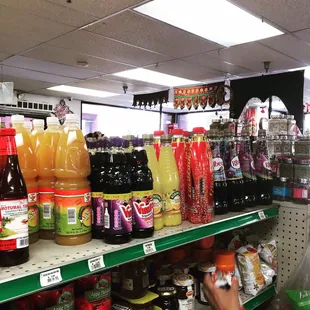 a variety of beverages on shelves