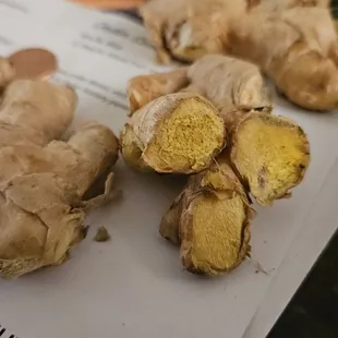 Ginger were chopped up pieces, dried out, weightless.  Looks like the ginger I had to toss because it  sat on the shelf for a month.