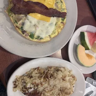 The butcher shop omelet, added green pepper. Hash browns. Fresh fruit
