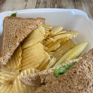 Tuna salad sandwich on toasted wheat bread