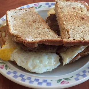 Breakfast sandwich with egg and sausage